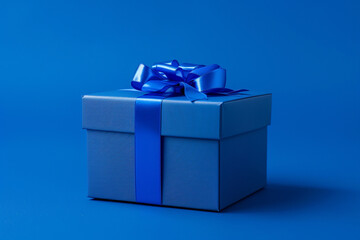 Realistic cobalt blue gift box on cobalt blue background, studio lighting, dof, blue overtones