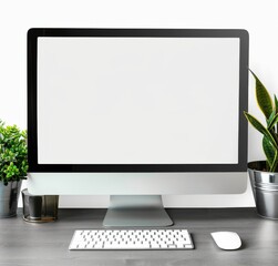 Fototapeta premium Modern desk setup with empty computer screen mockup and potted plants