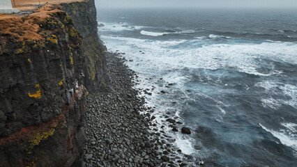 Majestic cliffs along the west coast in Latrabjarg Iceland during stormy weather and high waves
