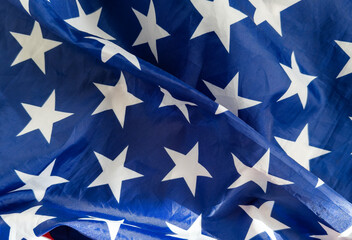 Close up America flag waving with the wind for memorial day. National symbol concept.