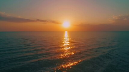 Obraz premium Aerial view of sunset horizon over the sea Cinematic drone aerial view beautiful evening sunset in sky over sea Sun path is reflected in sea surface Nature beauty : Generative AI