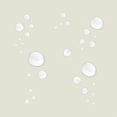 Realistic vector water drops on a light background. 