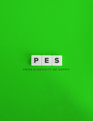 PES (Price Elasticity of Supply) Term and Banner. Text on Block Letter Tiles on Flat Background. Minimalist Aesthetics.