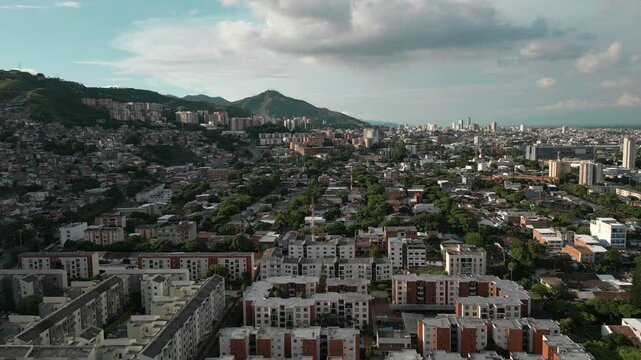 Aerial View of El Lido Tequendama Neighborhood, Cali Colombia. Pull Back Shot with Three Crosses Hill in the Background