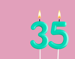 Green candle number 35 - Birthday card on pastel pink background