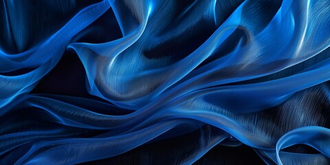 Obraz premium Close-up of Blue Fabric Texture, a Dark and Moody Background. This captivating image showcases the intricate texture of a blue fabric, captured in a close-up shot against a dark background.creating a 