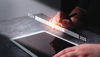 Woman use digital tablet with holographic interface for 2025 new year. New business start up. Target and goal action plan. Increasing business. Challenge and business strategy for next year.
