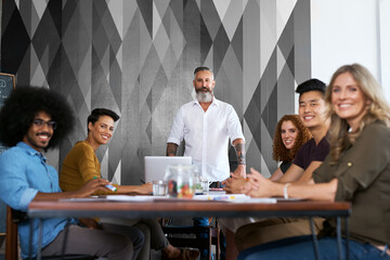 Creative, people and portrait in office with happiness or meeting, campaign ideas and project planning. Team, designer and brainstorming for inspiration or workshop, collaboration and diversity