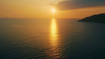 Fototapeta premium Aerial view of sunset horizon over the sea Cinematic drone aerial view beautiful evening sunset in sky over sea Sun path is reflected in sea surface Nature beauty : Generative AI
