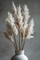 Fototapeta premium White Vase With Dried Pampas Grass on a Shelf
