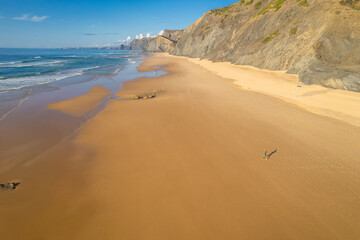Aerial View of Serene Cordoama Beach in Algarve, Portugal from a Dron