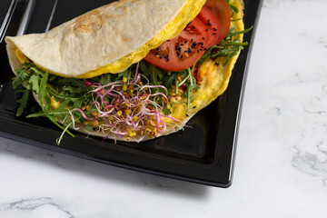 Tortilla omelette with vegetable filling