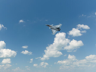 Normandy, France - June 8, 2024: French Naval Air Force F-16 fighter in flight during D-Day to mark...