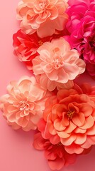Pink and Red Fabric Flowers on Soft Pink Background
