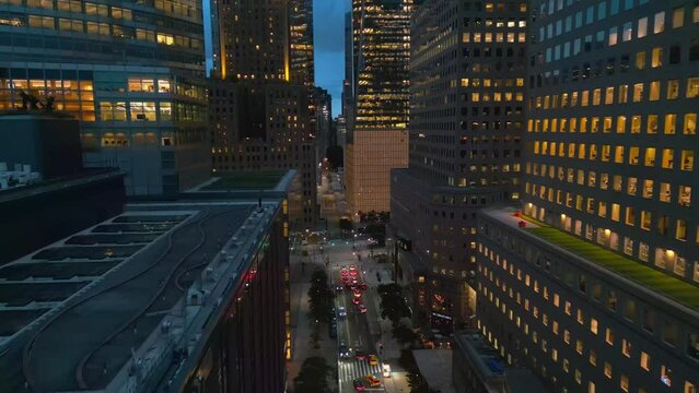 New York City Skyline at dusk night aerial view. NYC near night clouds from drone. New York City skyline, cityscape of Manhattan in USA. Panoramic view on Manhattan at night.