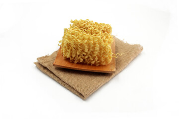 dry noodles, egg noodles, isolated on a white background