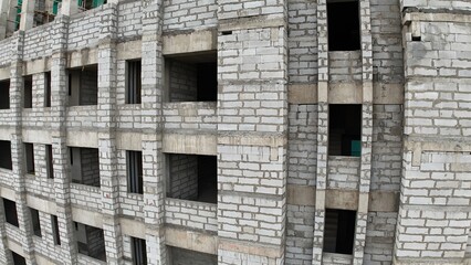 Under construction building tower slabs commercial aerial view columns 