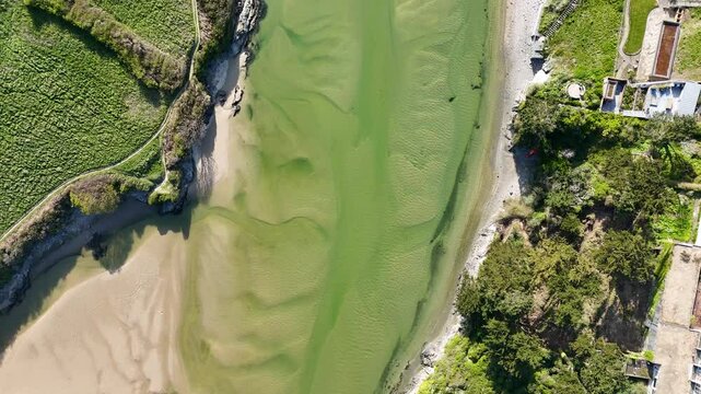 River Gannel and tidal estuary between Newquay town and the village of Crantock in Cornwall, UK