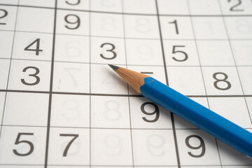 Sudoku puzzle game playing to challenge brain.