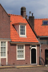 Monnickendam Street View with Red Brick House Exterior, Netherlands