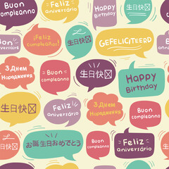 Happy Birthday seamless pattern design. Happy Birthday in different languages in speech bubbles.