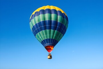 Fototapeta premium Hot Air Balloon in Flight at Blue Sky. Perfect for Adventure and Travel Concepts