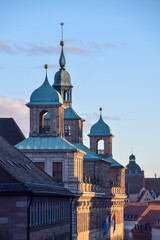 Naklejka premium Top cityscape view from the castle hill on the old town with cathedral in Nurnberg, Germany