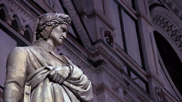 Statue of Dante Alighieri in Piazza Santa Croce, Florence, Tuscany, Italy. Close Up. 4K Resolution.