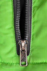 Green unzipped background © Tarzhanova