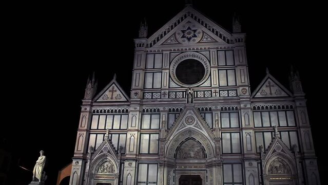 Statue of Dante Alighieri and the Basilica of Santa Croce, Burial Place of some of the most Notable Italians, such as Michelangelo, Galileo, Machiavelli, Florence, Tuscany Region, Italy. 4K Resolution