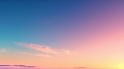 Fototapeta premium Background of a clear sky at sunrise with a gradient of warm colors