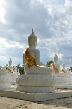 The white Buddha statue was created by a devotee for a Buddhist temple.Thailand, Khemmarat, Ubon ratchathani