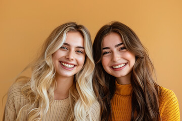 Beautiful smiling young women with healthy shiny long hair	