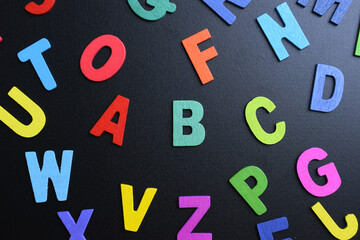 colorful letter alphabet on black background, object for education