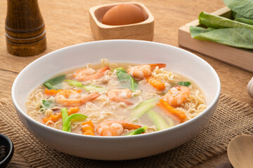 Fried Instant Noodles with Shrimp and kale carrot in Gravy Sauce (rad na goong).Thai food