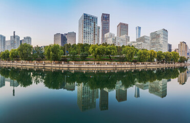 Obraz premium The modern urban architecture skyline and ancient canal scenery of Beijing, the capital of China 