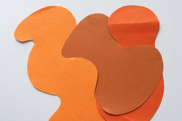 three wavy shapes partly interlocking
