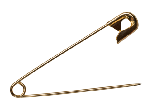 Golden metal safety pin on isolated background