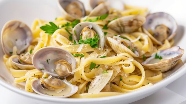 Savory linguine with clams in white wine sauce, fresh herbs, isolated, well-lit