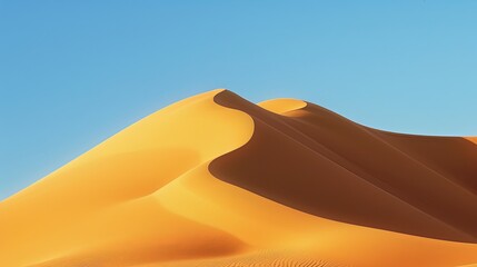 Dunes in the desert, smooth curves of sand dune with clear blue sky