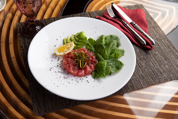 Beef tartare in a plate.