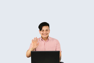 Front Desk Male Receptionist with Mobile Device Laptop and Notepad gives expressions and gestures of happy in Office Environment