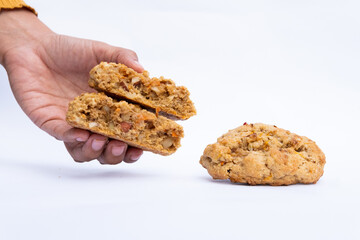 Close up of carrot cookie on white background