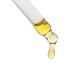 Fototapeta premium Dripping tincture from pipette isolated on white