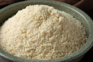 Fresh almond flour in bowl, closeup view