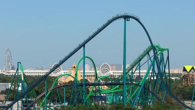 Adventure amusement park with high thrilling rollercoaster attraction in Orlando, Florida.