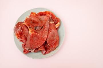 Marinated beef with pepper on dish