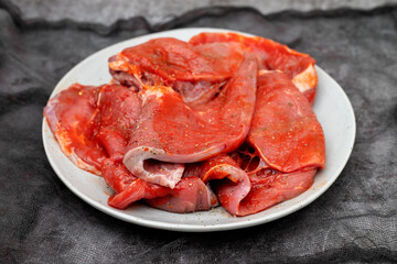 Marinated beef with pepper on dish