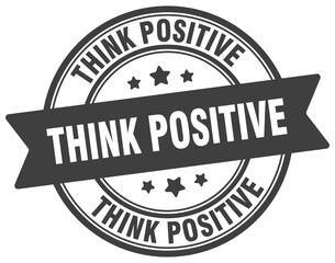 Obraz premium think positive stamp. think positive label on transparent background. round sign