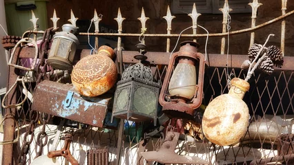 Old rusty utensils decorate the wall. Vintage Wallpaper © Valeriia Zub